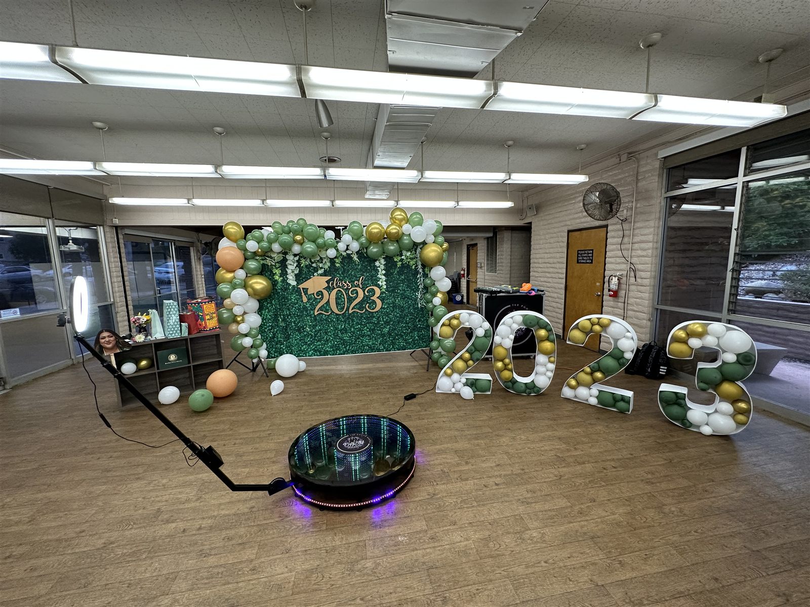 360 Party Wheel booth at a Class of 2023 graduation with balloon marquee numbers